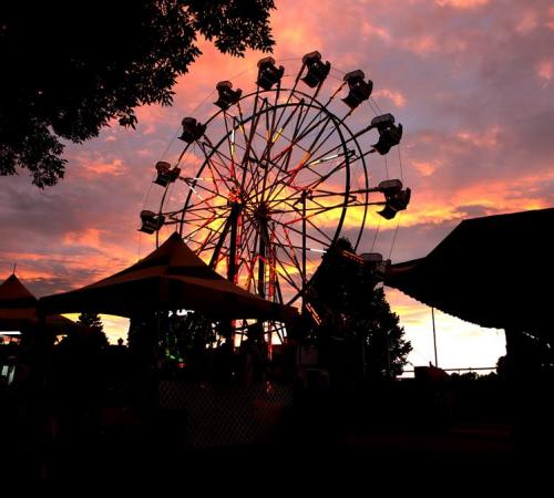 Carnival Ferris wheel at night